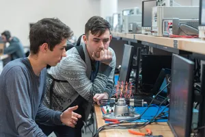 People working on a benchtop project