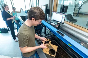 Removing a laser-cut design from a CO2 laser cutter